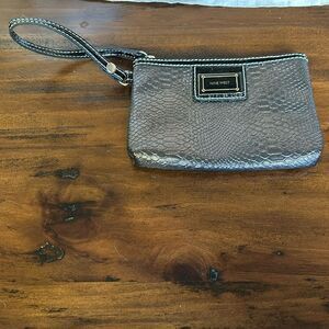 Nine wear  wristlet impeccable condition faux snake leather gray and black